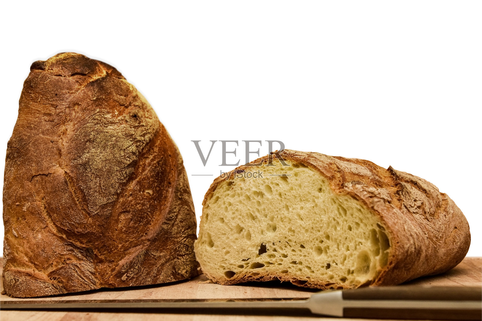 孤零零的木桌上放着一把面包刀照片摄影图片