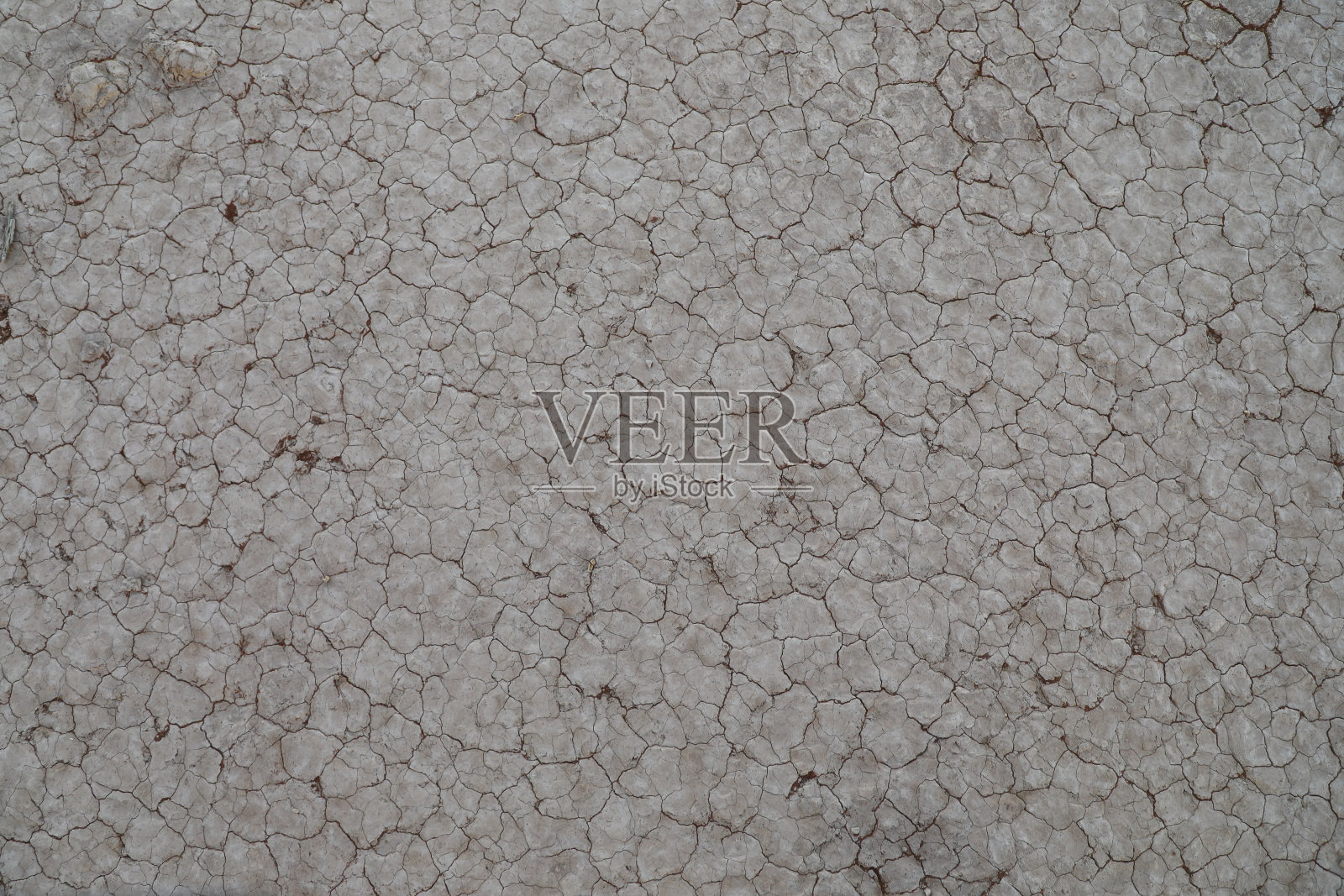 干旱时灰泥开裂照片摄影图片