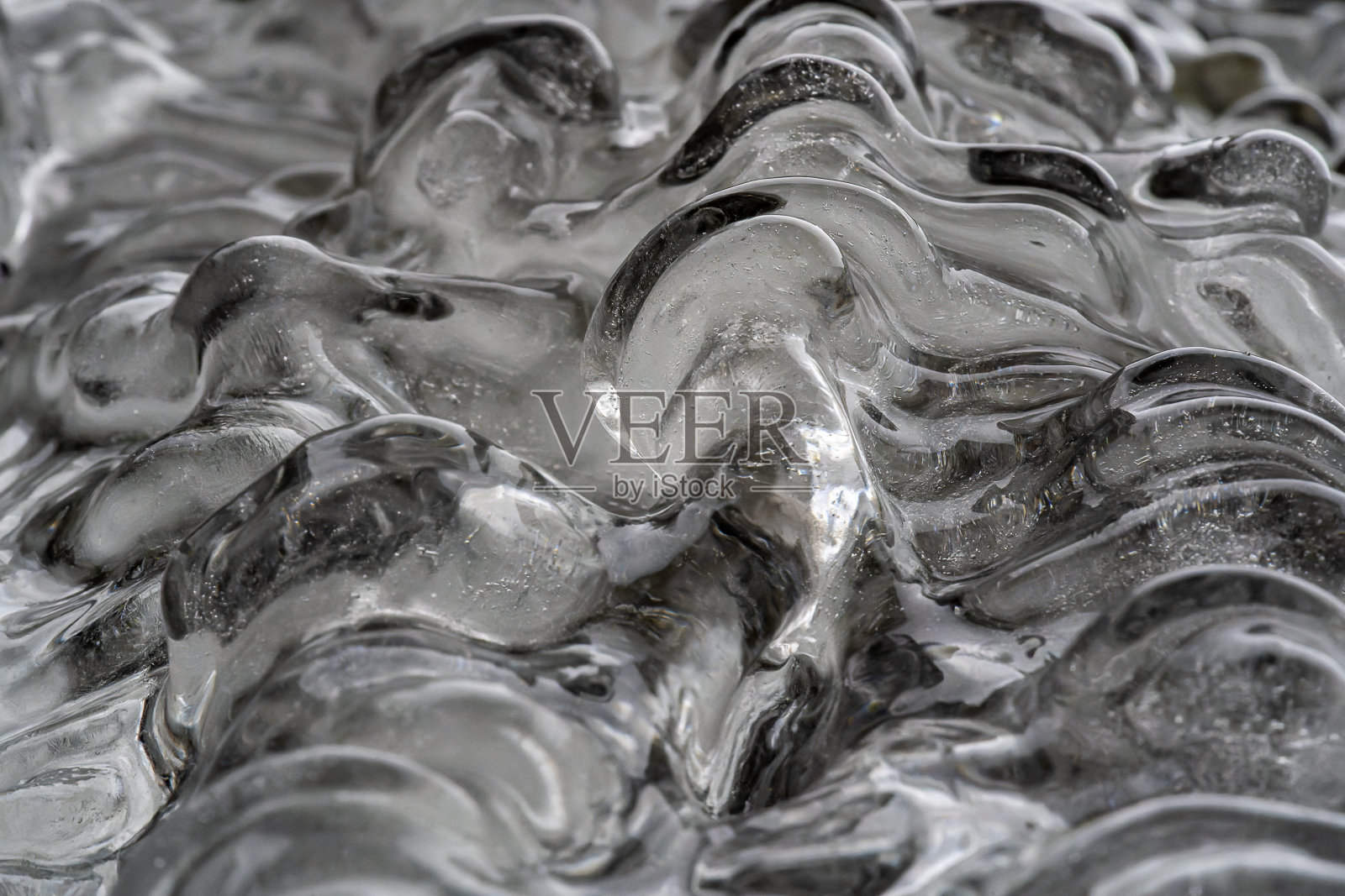 隆冬冰冻冰柱的特写照片摄影图片