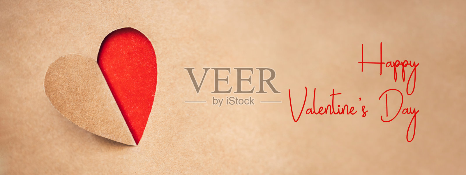 用纸剪下的情人节爱心。照片摄影图片