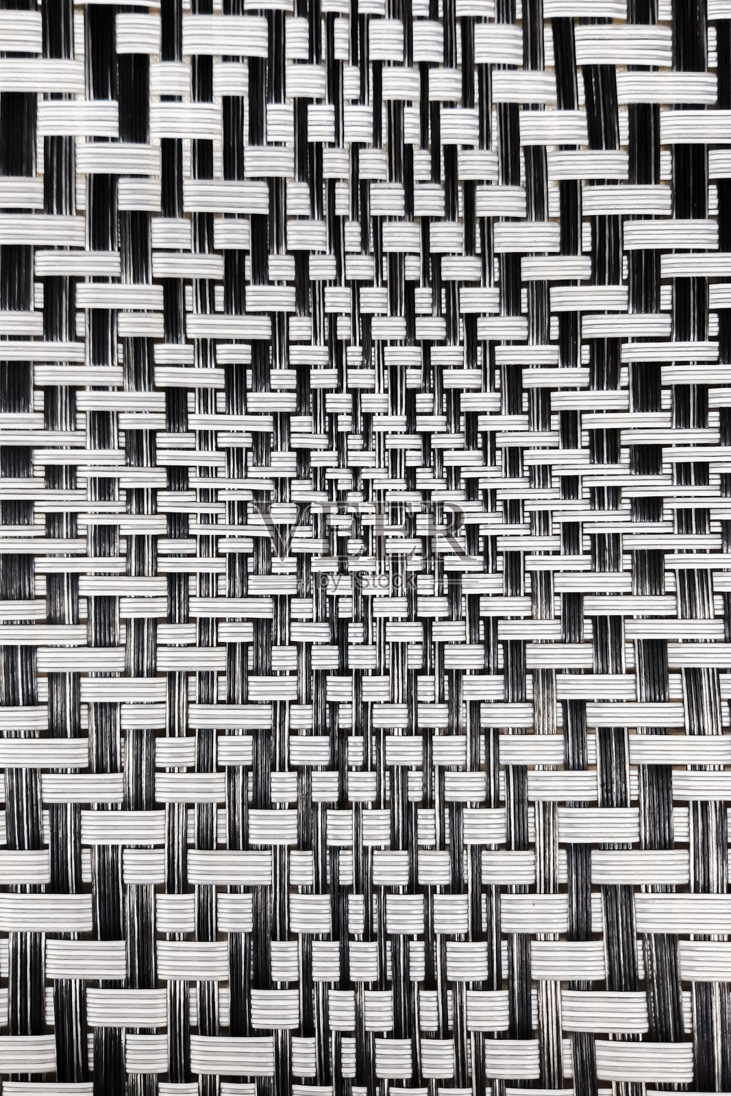 抽象塑料纹理接近。模式在织物上。网格曲面。照片摄影图片