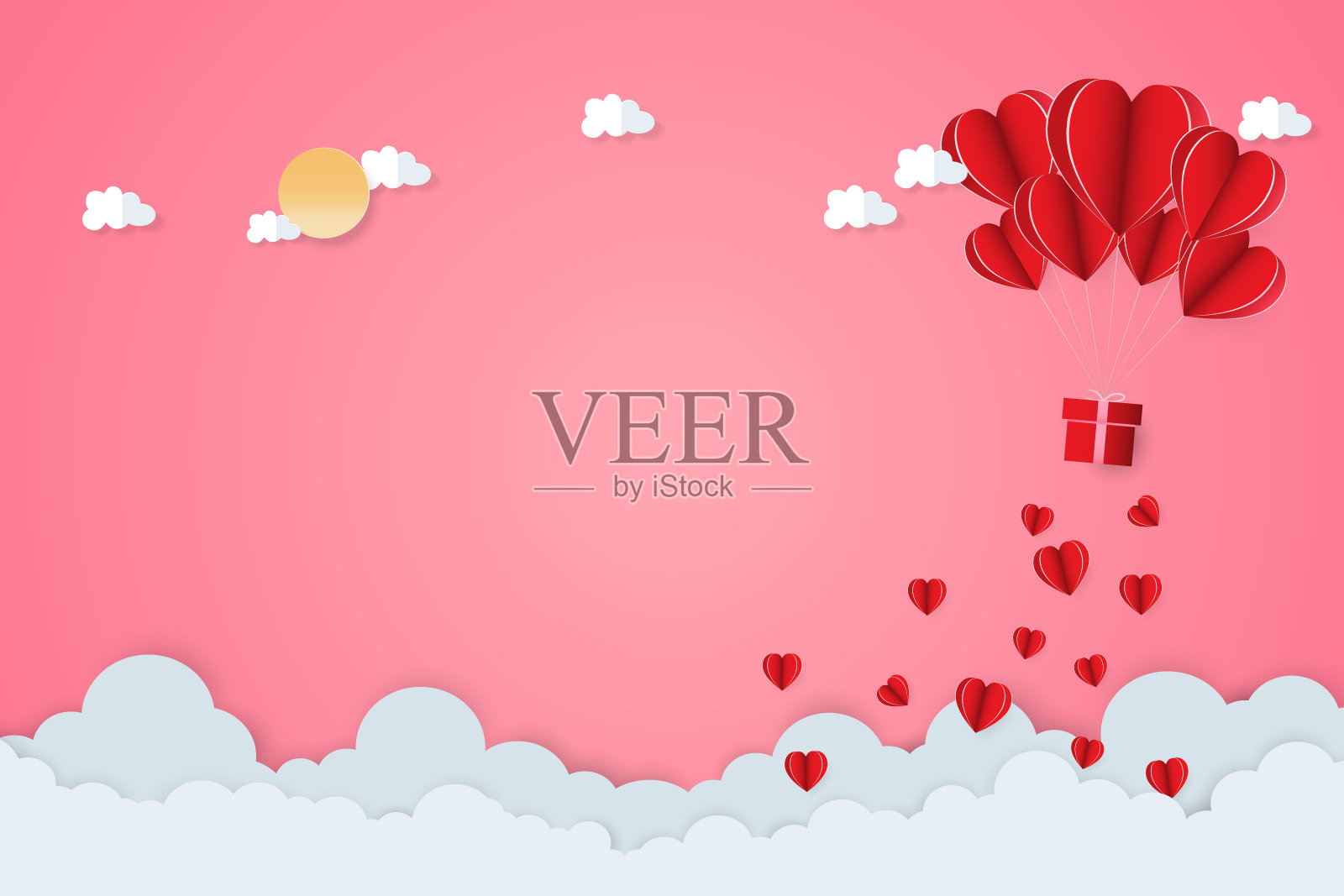 情人节的纸艺有心形纸、云形纸和粉色天空上的太阳形纸。照片摄影图片