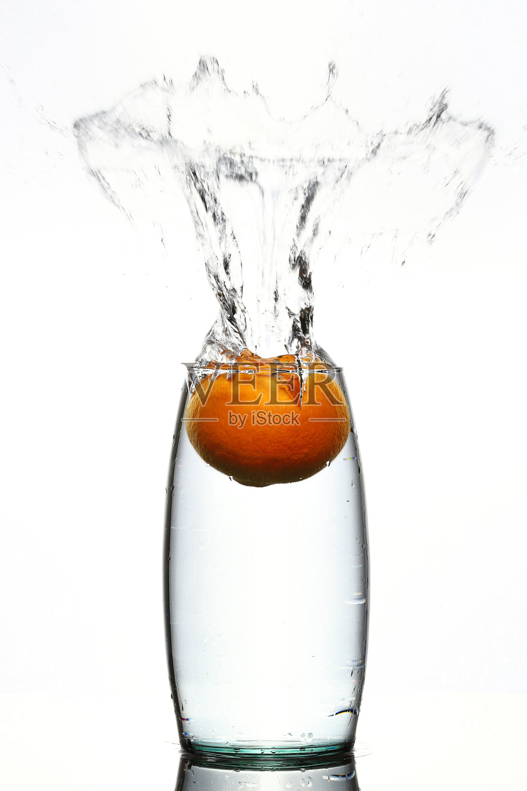 花瓶里的橙色水花照片摄影图片