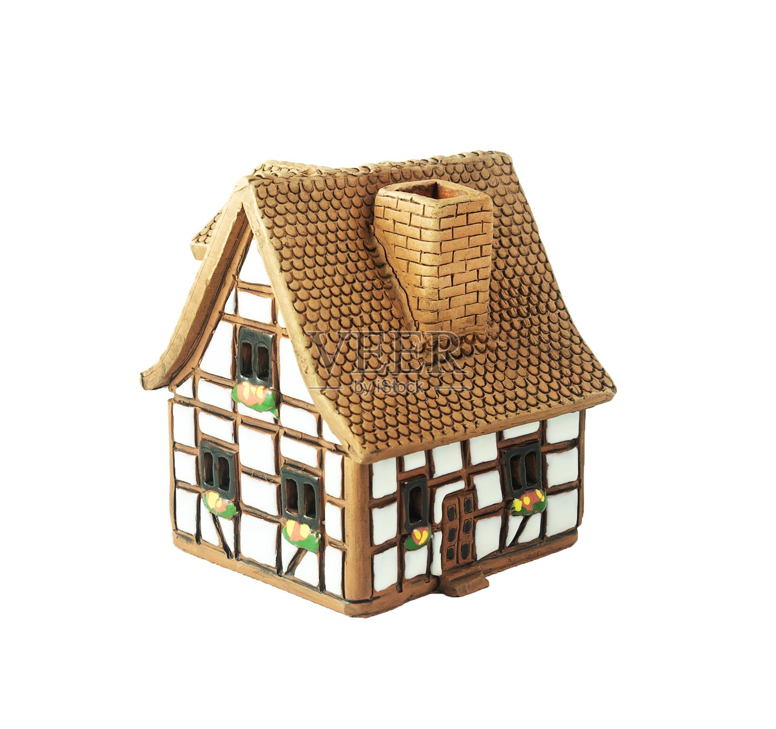 小陶瓷房子孤立在白色上照片摄影图片