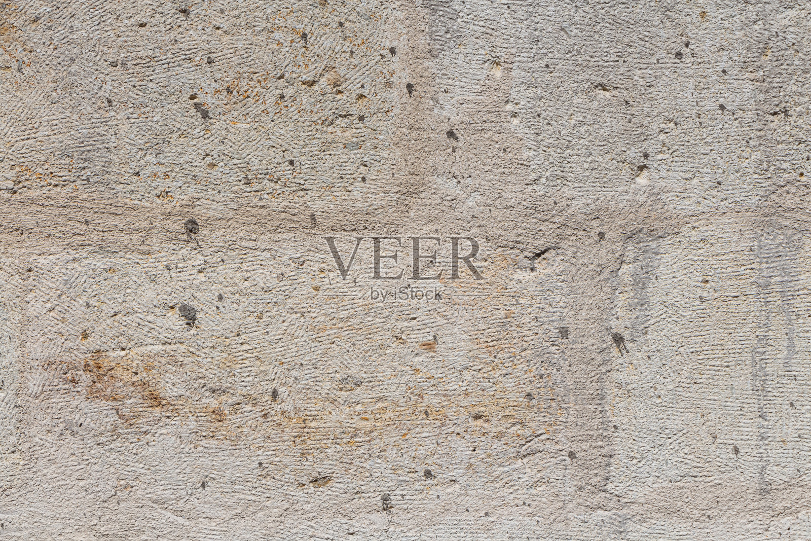 美丽的水平纹理部分旧混凝土黄色墙壁的孔照片摄影图片