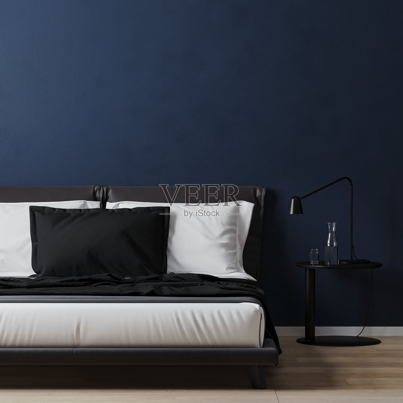 床上有白色和蓝色的枕头和床上用品桌，房间里有深蓝色的墙壁，3d渲染照片摄影图片