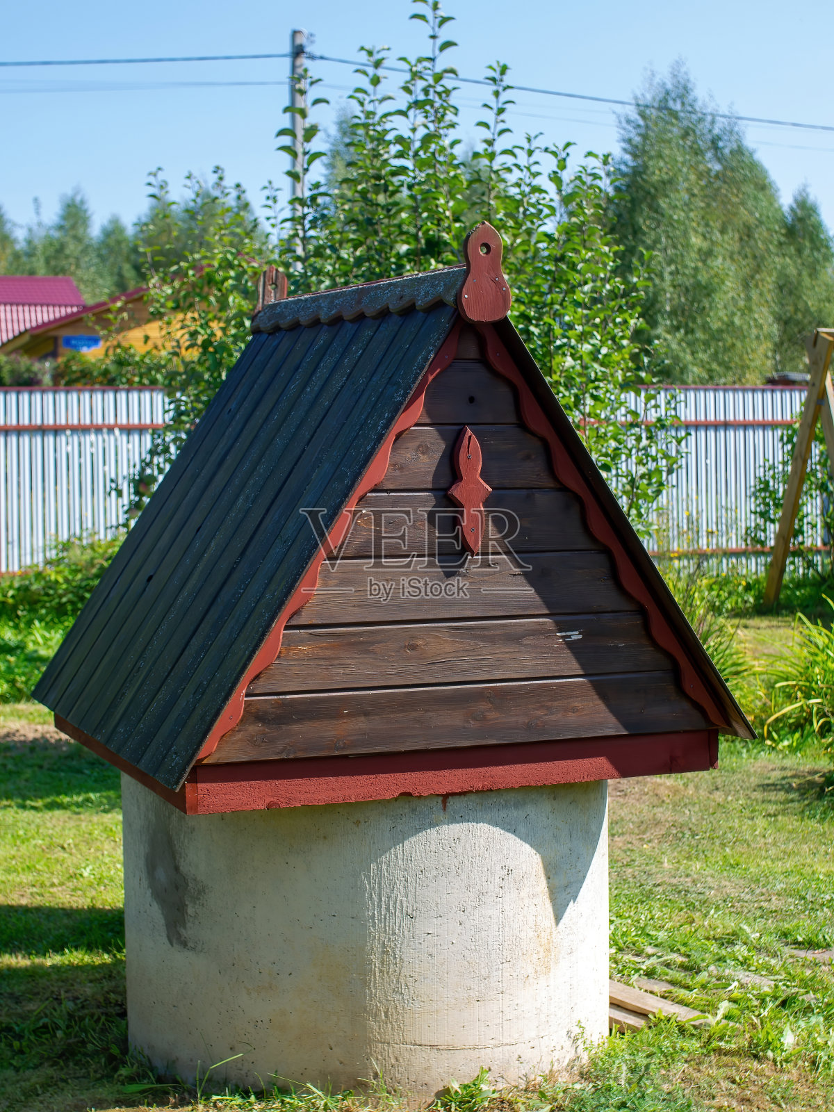农村地区的混凝土井照片摄影图片