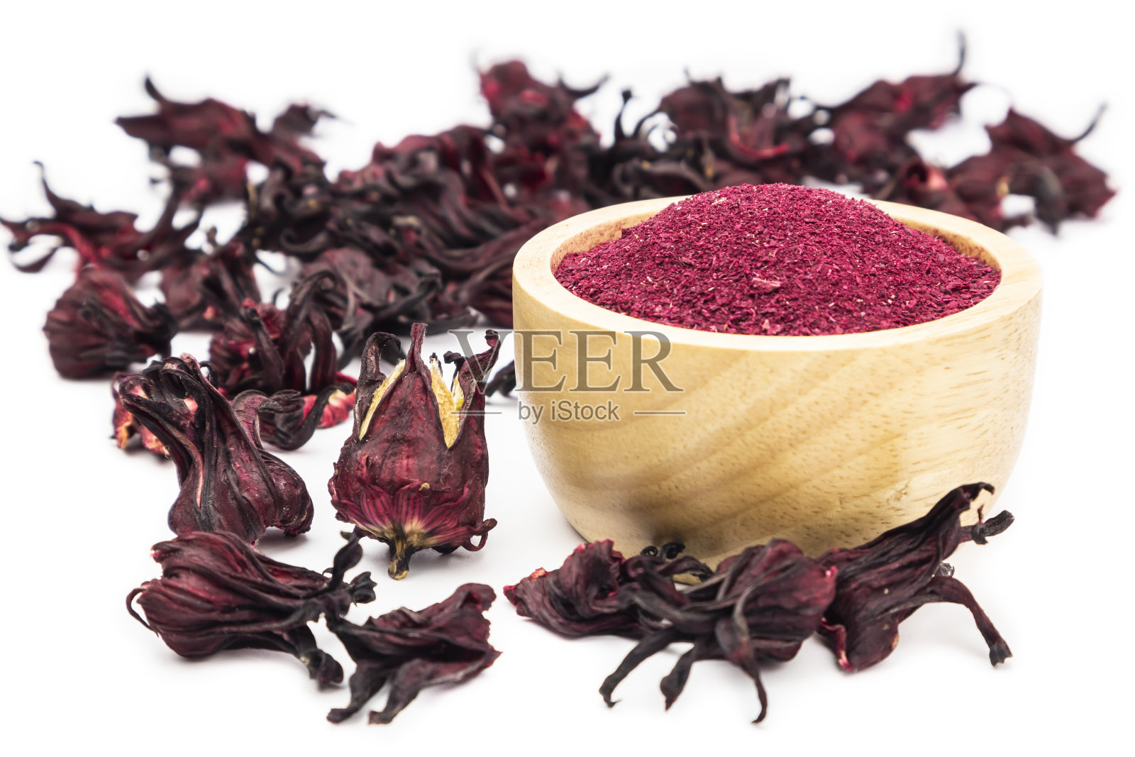 玫瑰花蕾粉，木碗，白色底色照片摄影图片