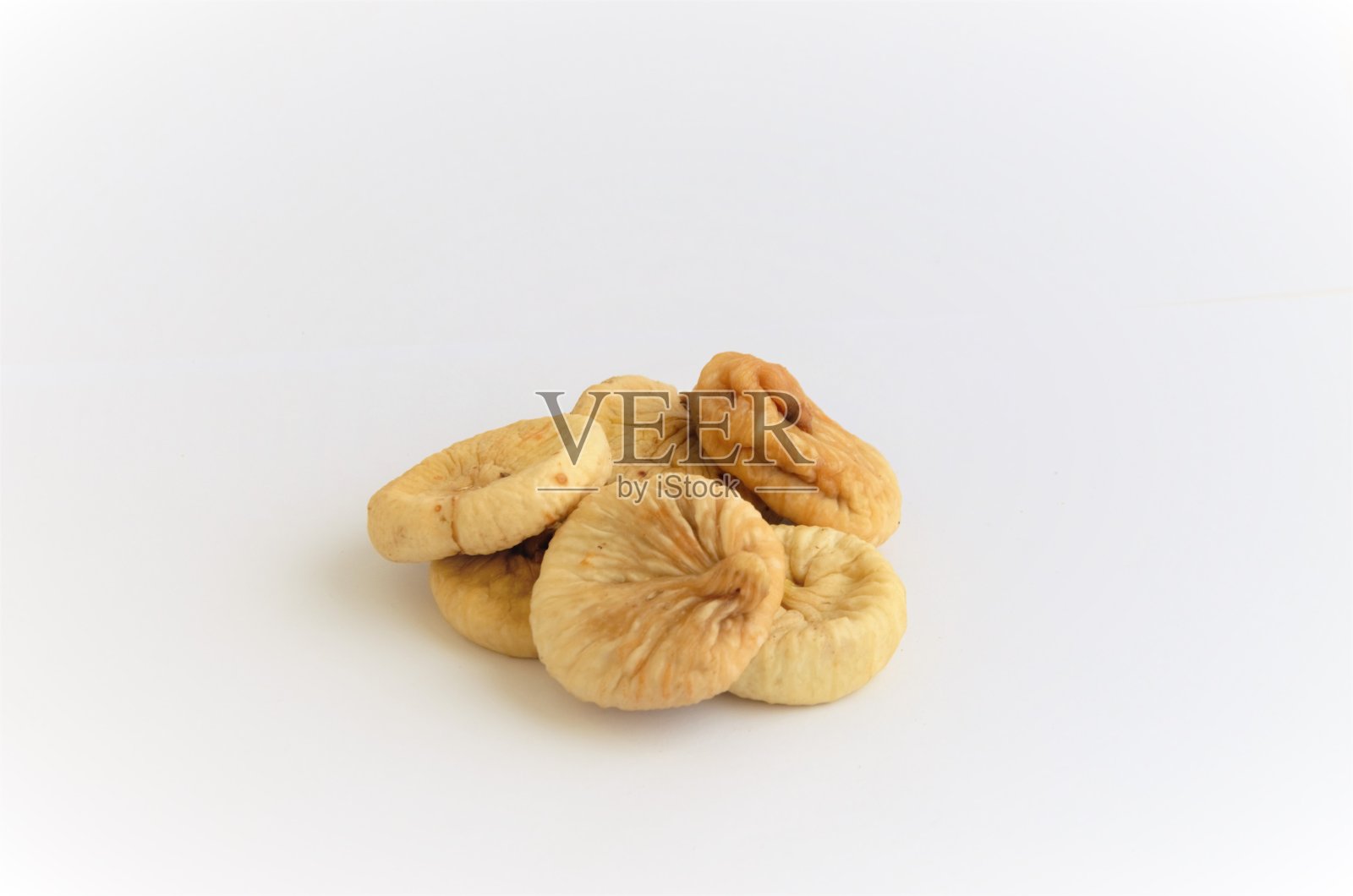 无花果干果在白色背景上照片摄影图片