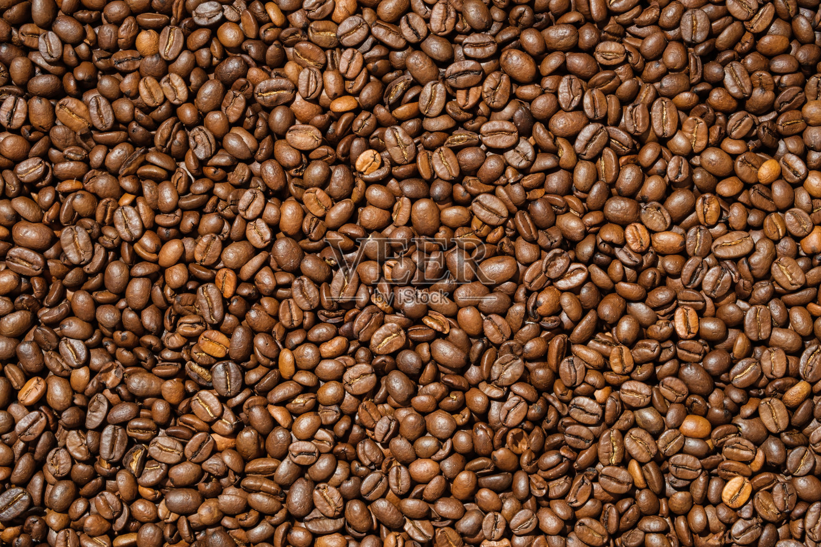 背景来自烘培芳香的咖啡豆。照片摄影图片