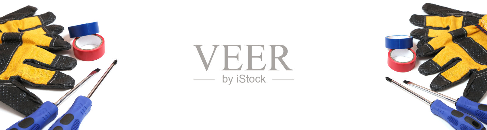 一套工人，电工手套，螺丝刀和白色背景的胶带。照片摄影图片