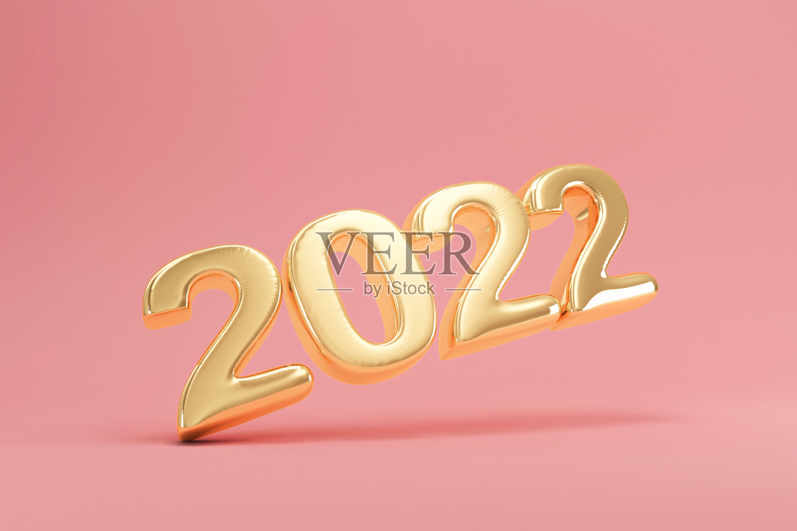 粉色工作室背景上的金色2022年新年标志照片摄影图片