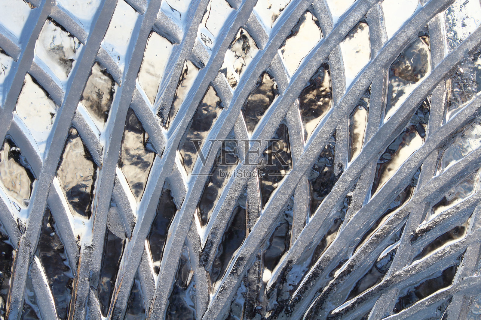 美丽的冰雕墙。特写镜头。背景。纹理。照片摄影图片