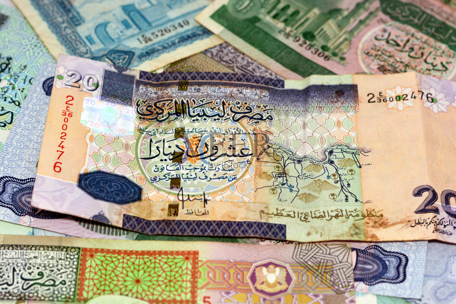 利比亚货币第纳尔钞票的背景，古利比亚货币钞票，利比亚第纳尔是利比亚的货币照片摄影图片