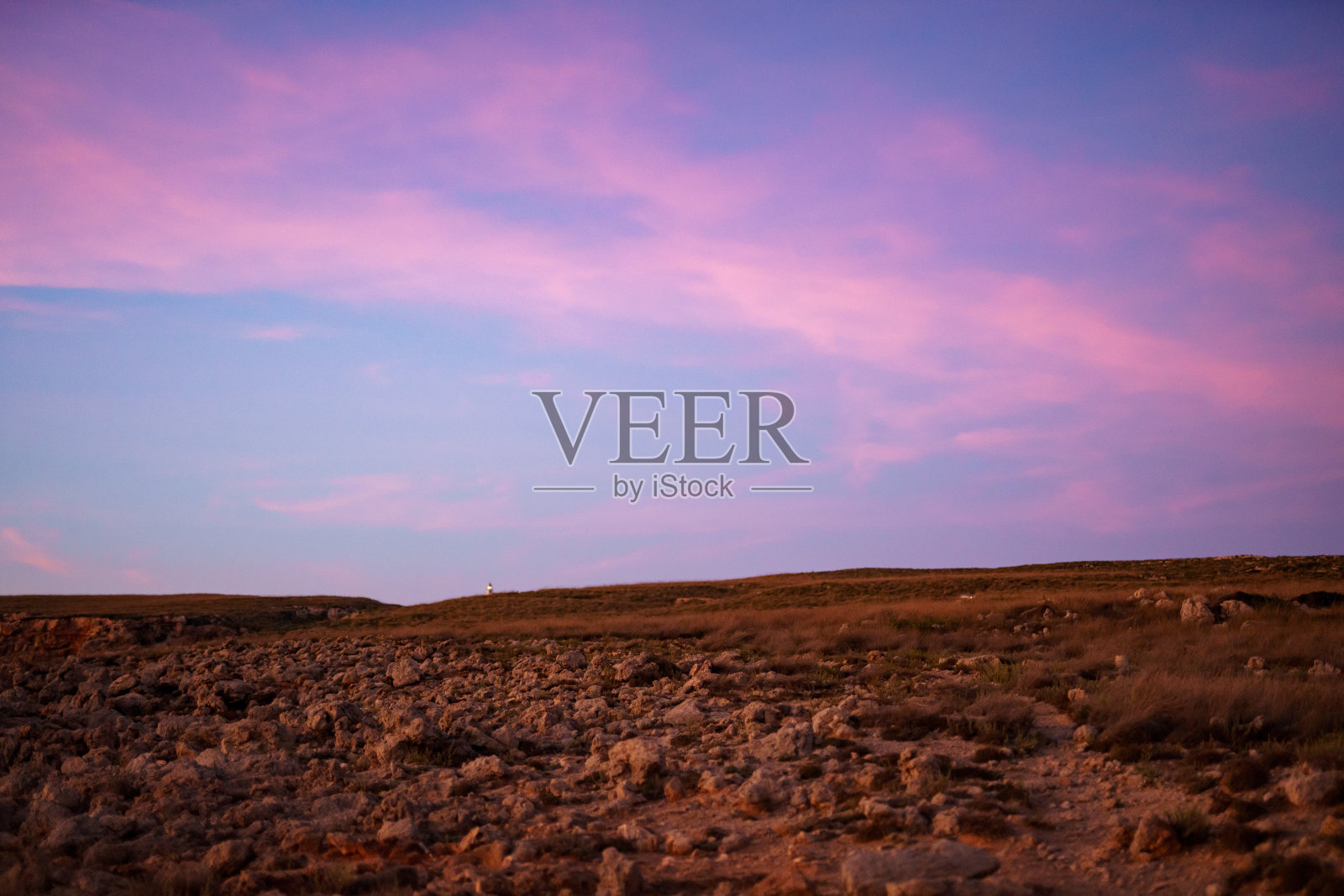 梅诺卡岛的橙色日落。照片摄影图片