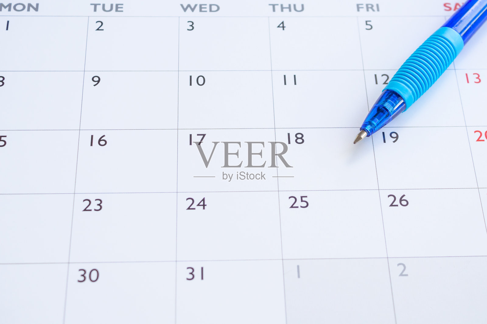 蓝色笔在日历页背景商务计划预约会议概念照片摄影图片