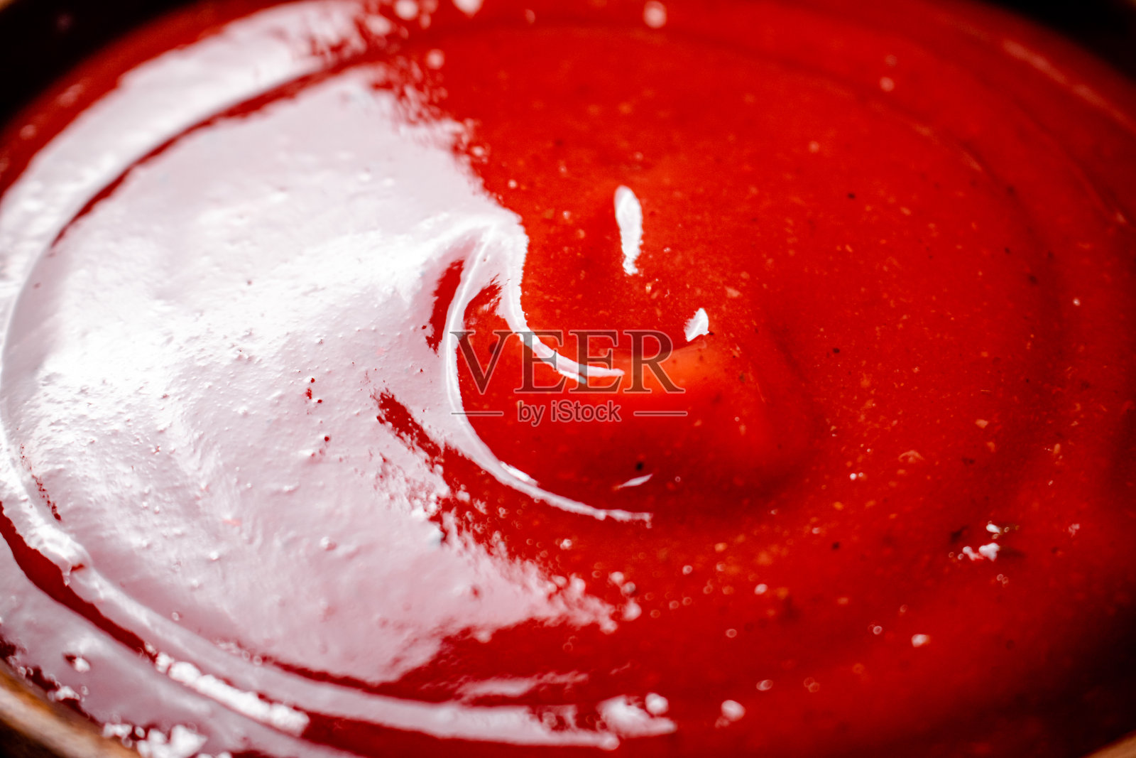 番茄酱。宏观背景。番茄酱的质感。照片摄影图片