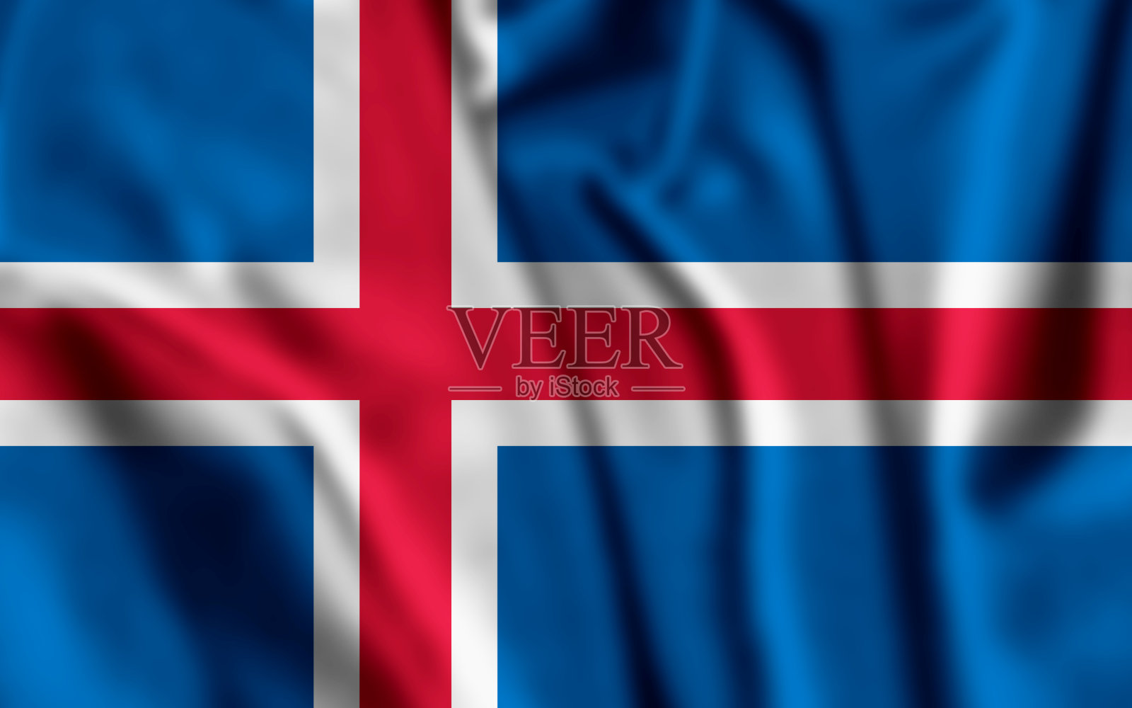 冰岛的旗帜。近距离观看冰岛飘扬的国旗。冰岛国旗的象征。照片摄影图片