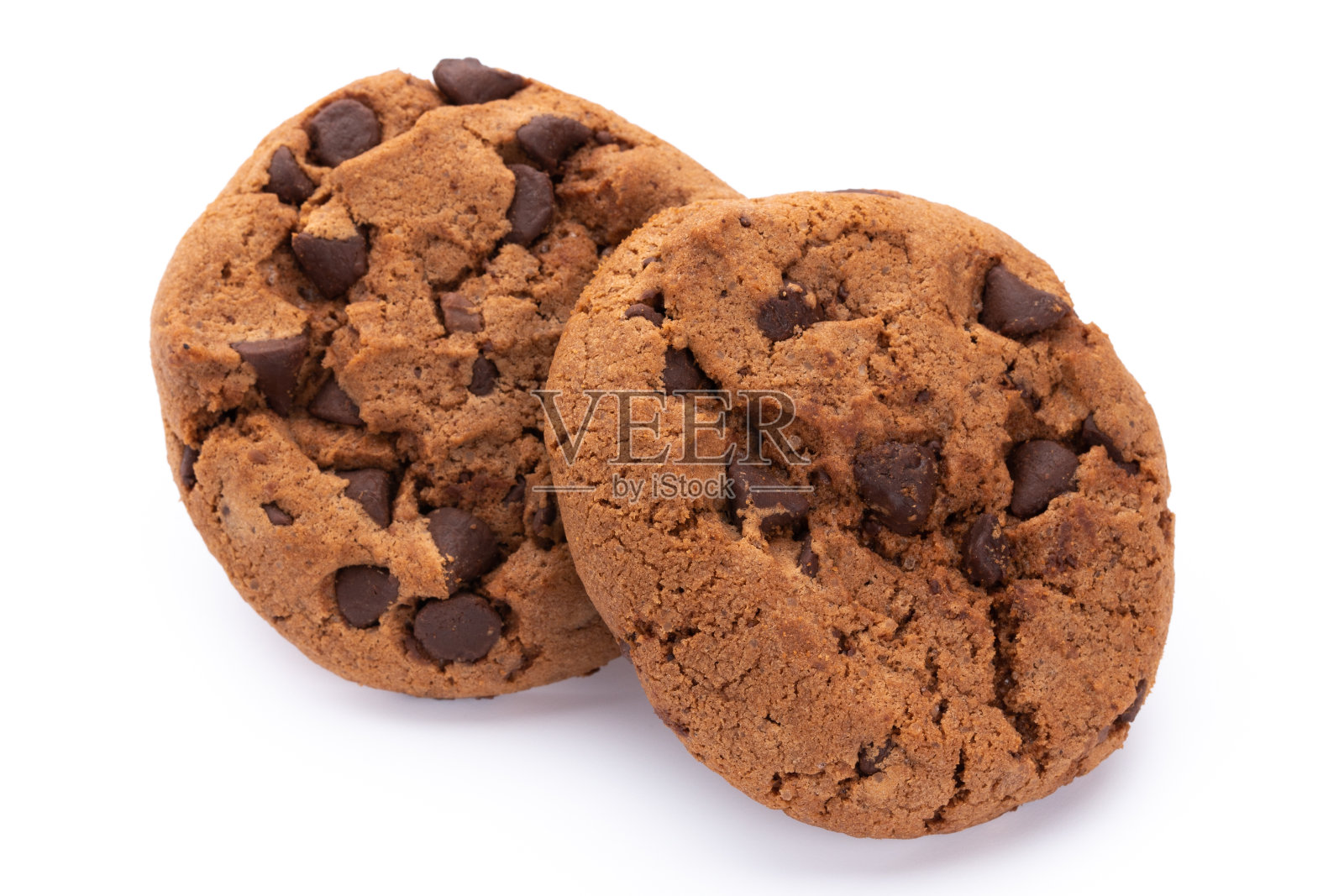 白色背景上的巧克力饼干。甜的饼干。自制的糕点。照片摄影图片