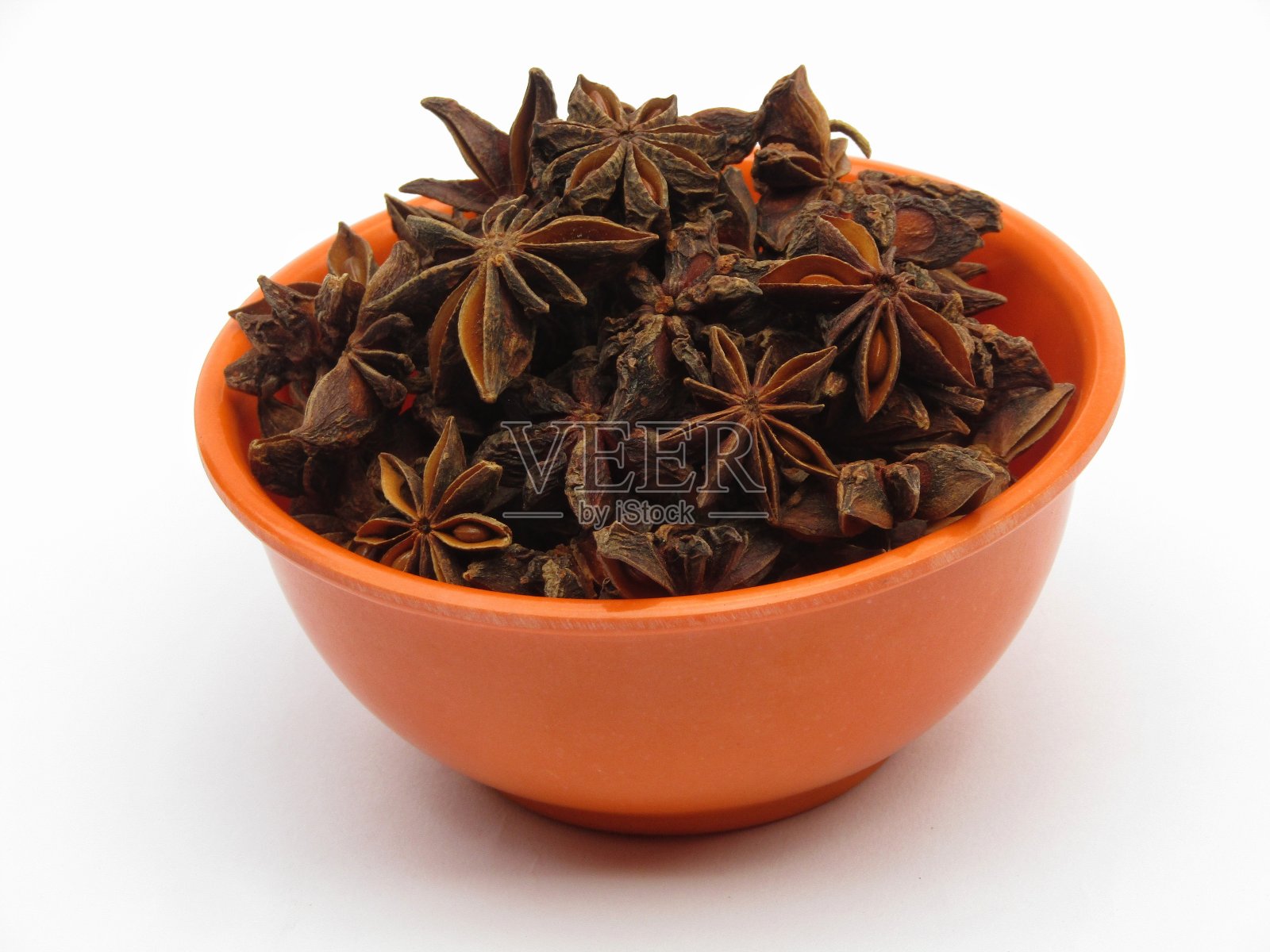 大茴香在碗里，白色背景照片摄影图片