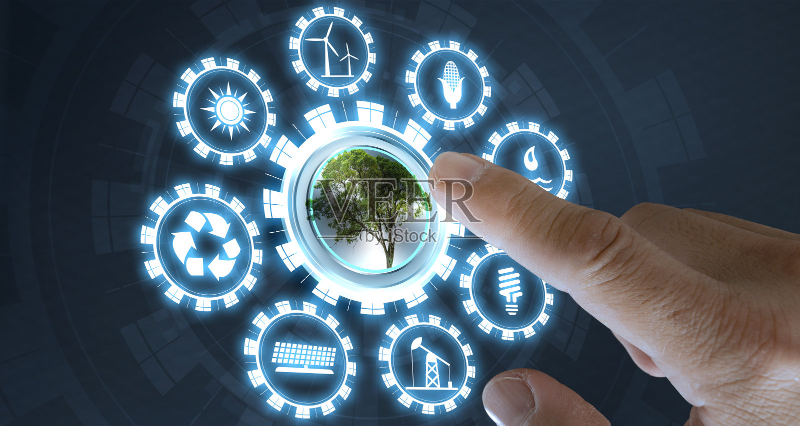 商人按下树键，暗色背景下有虚拟光，有图标能量照片摄影图片