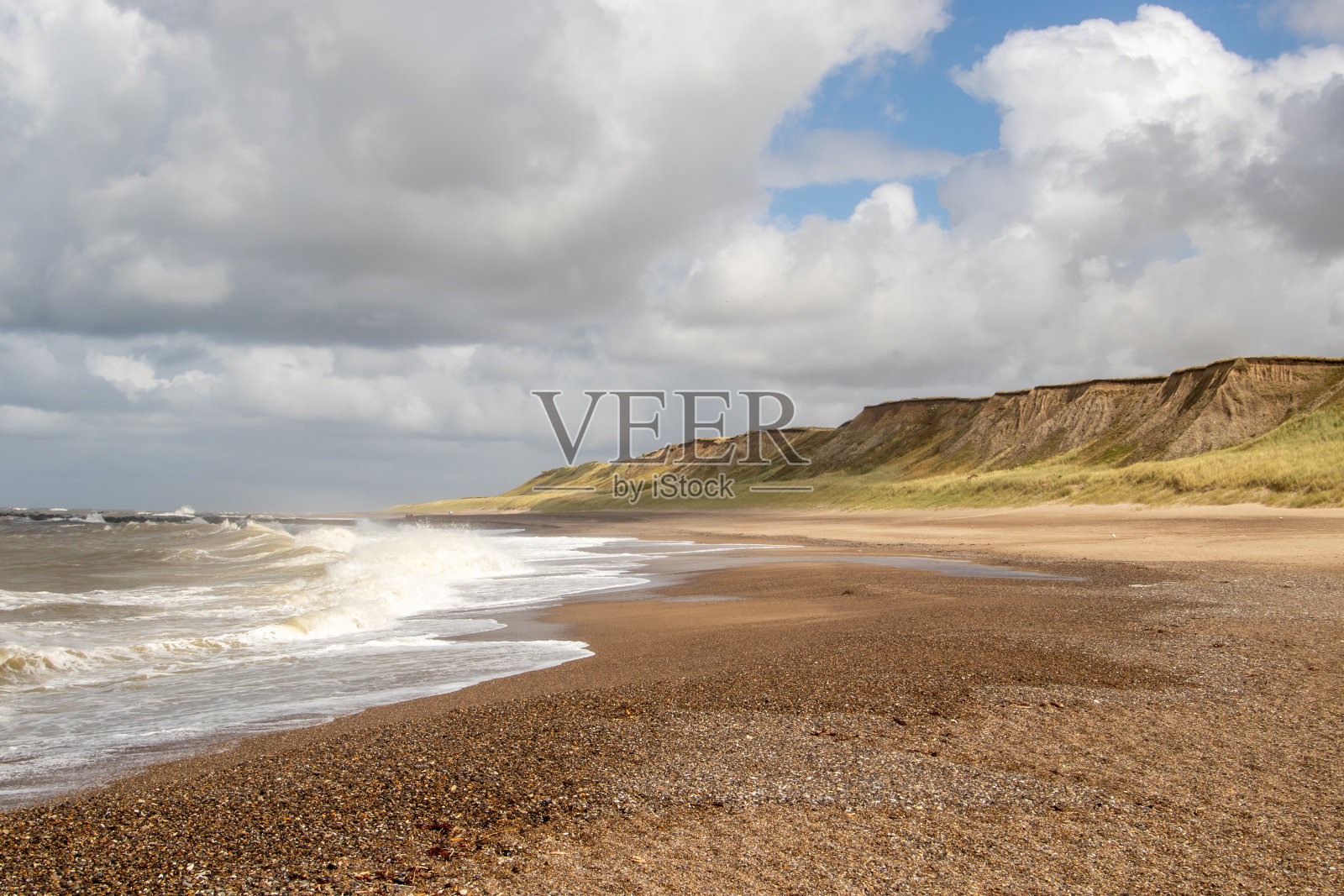 暴风雨天北海海滩上的云照片摄影图片