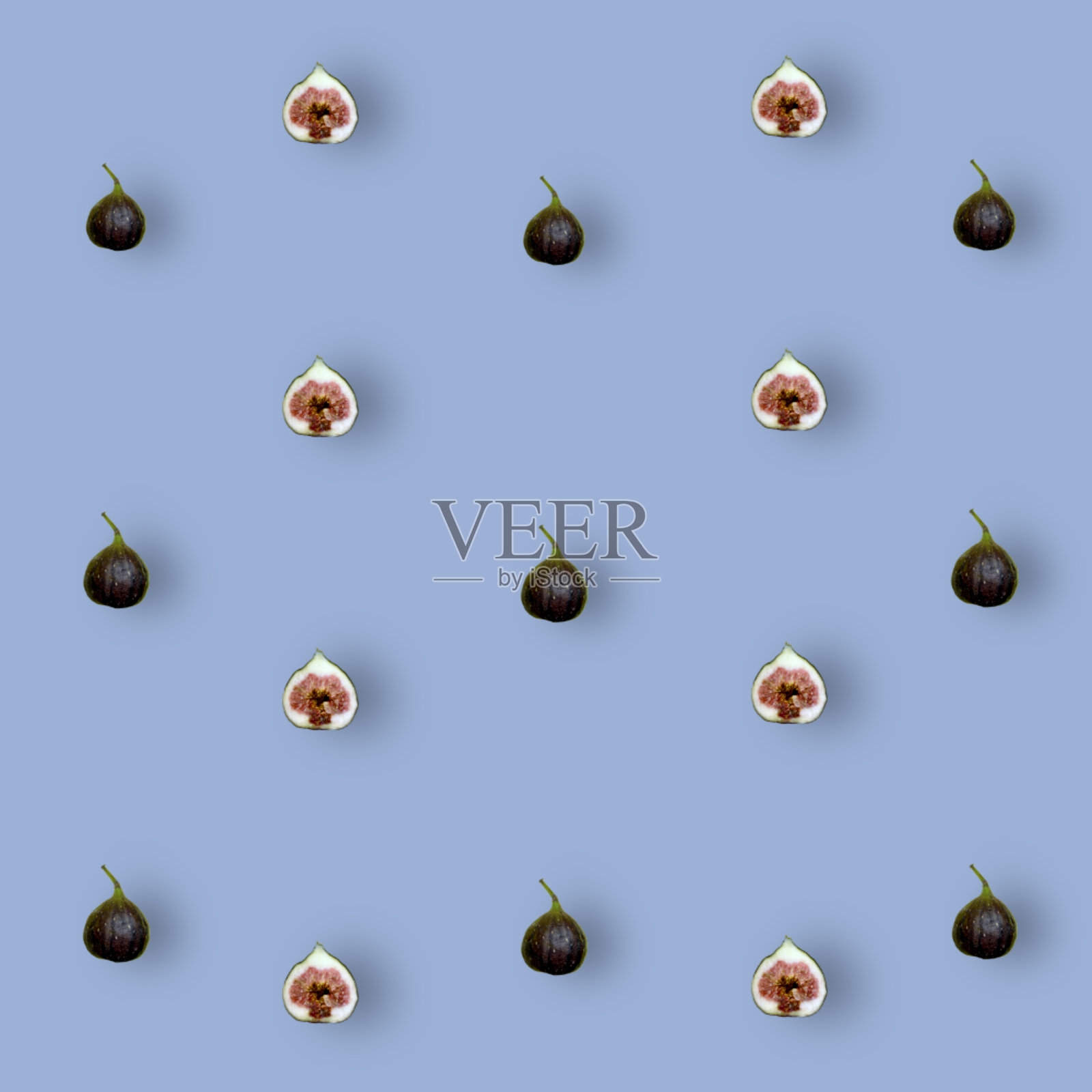 彩色水果图案的新鲜无花果切片蓝色背景。前视图。平的。波普艺术设计照片摄影图片