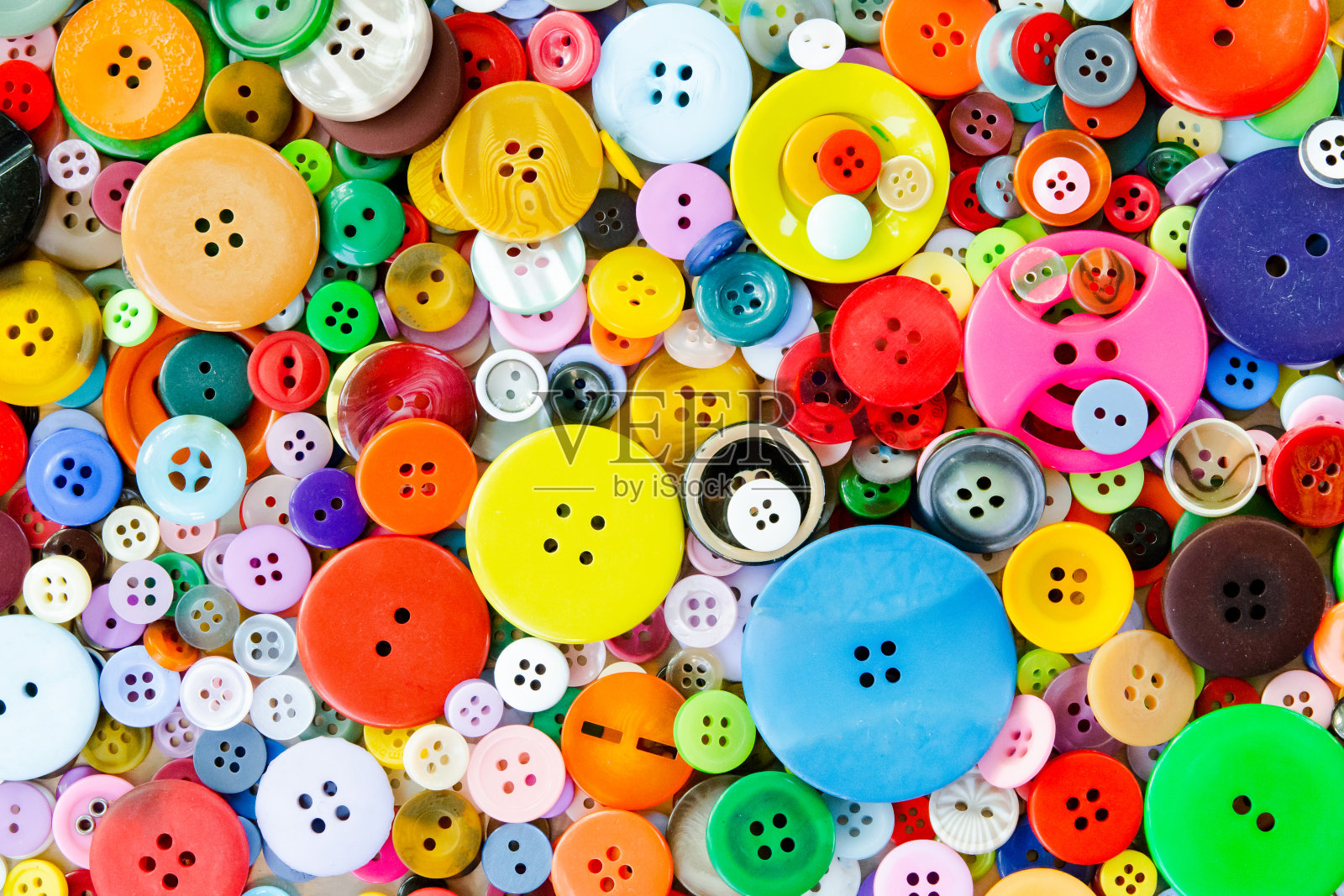 彩色混合缝纫钮扣背景。俯视图照片摄影图片