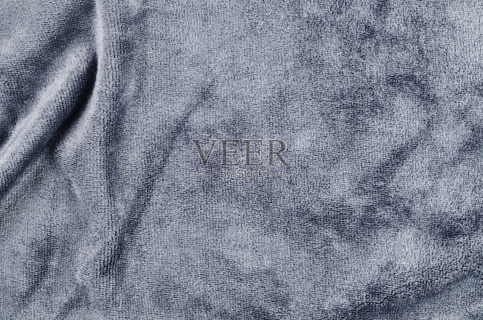 深色超纤维毛巾纹理。照片摄影图片