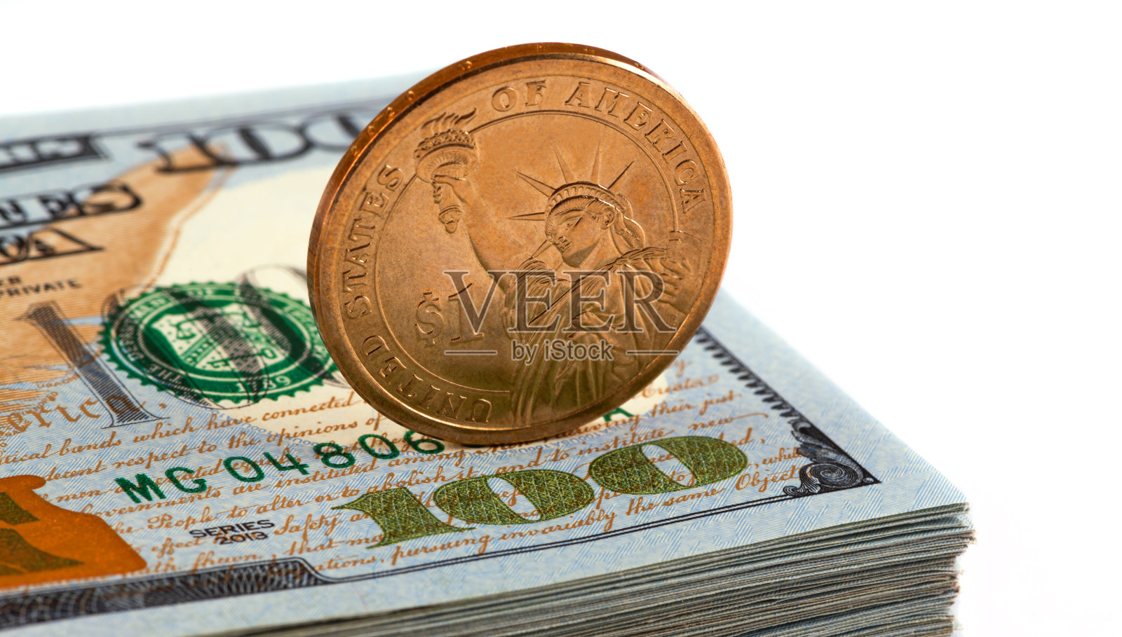 铸造一美元和一百美元照片摄影图片