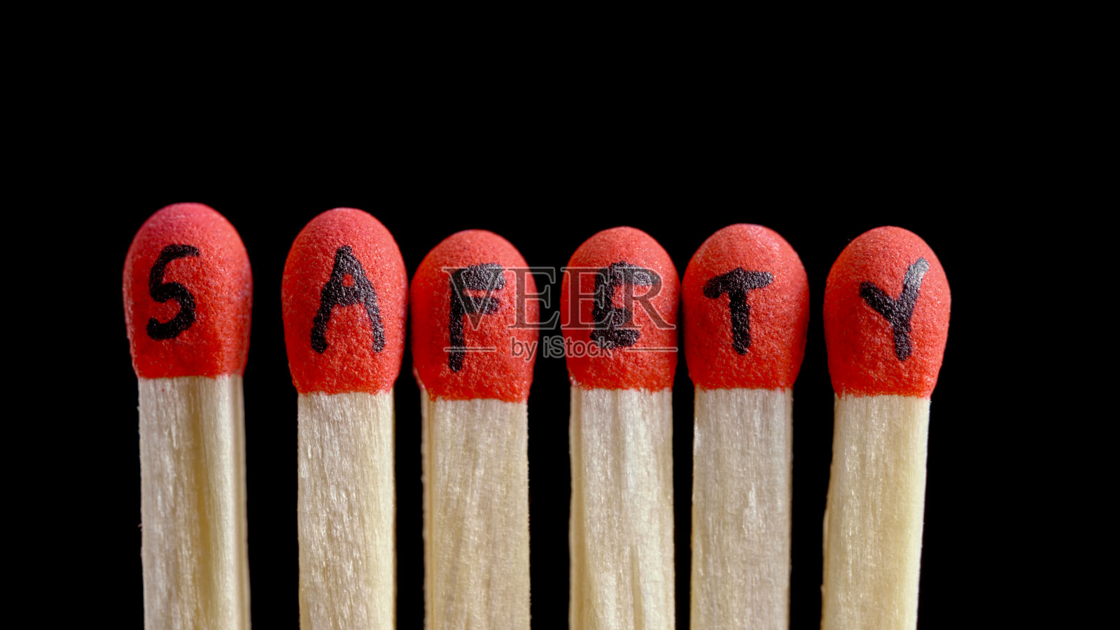 火柴棒上写着“安全”字样照片摄影图片