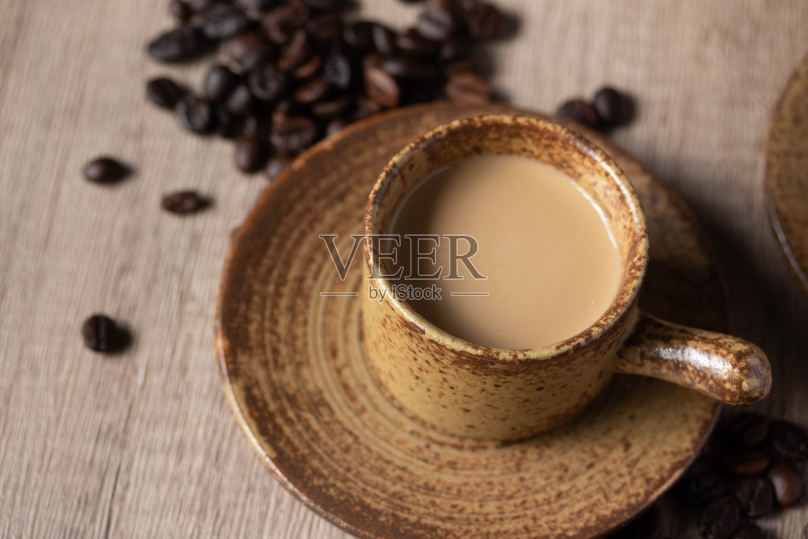 热咖啡在棕色杯子木制背景照片摄影图片