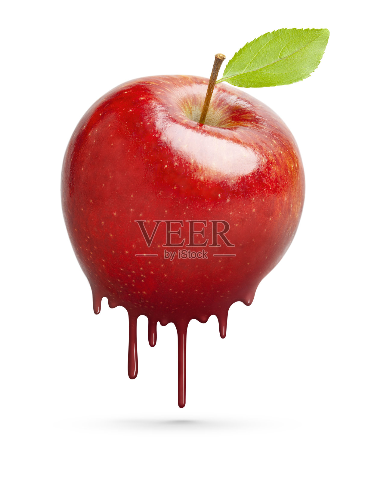 红色液体苹果概念与绿色叶在白色照片摄影图片