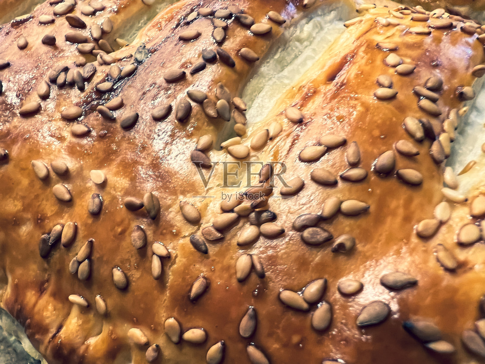 香脆的芝麻酥皮。照片摄影图片