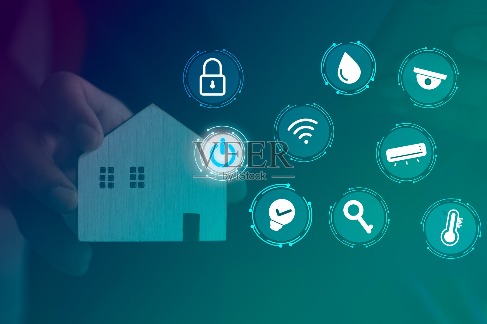 手持home图标屏幕智能家居控制。智能家居自动化控制系统照片摄影图片