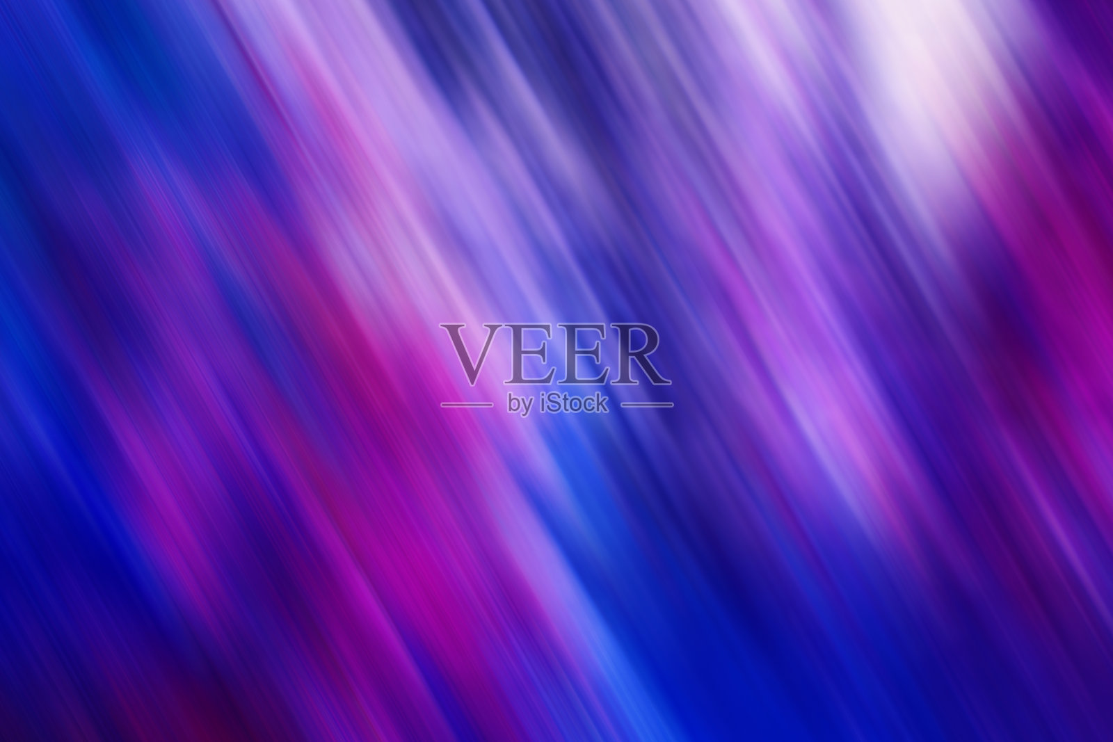 蓝紫色抽象背景与明亮的耀斑。照片摄影图片