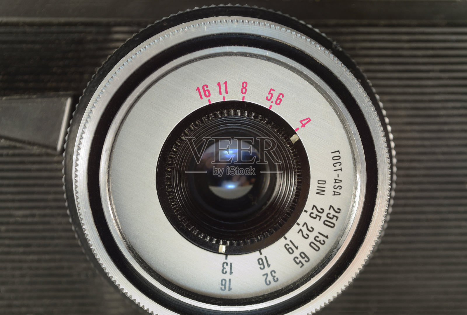 老式胶卷相机镜头的特写。照片摄影图片