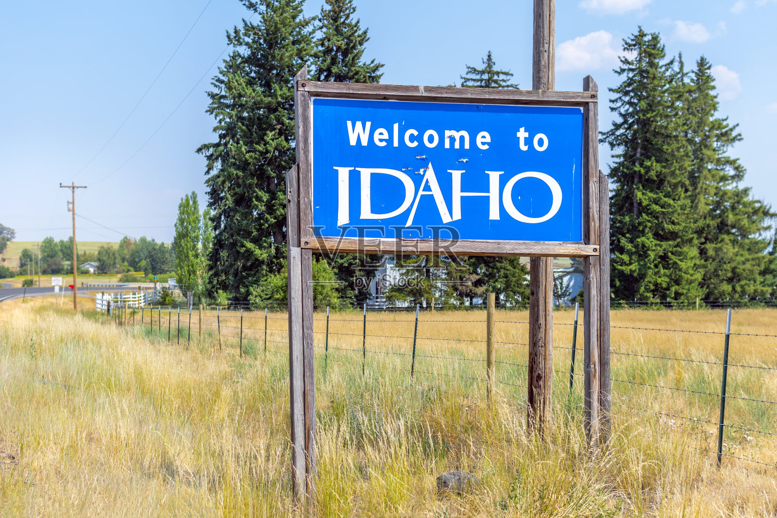 欢迎来到爱达荷州农村地区的路边标志照片摄影图片