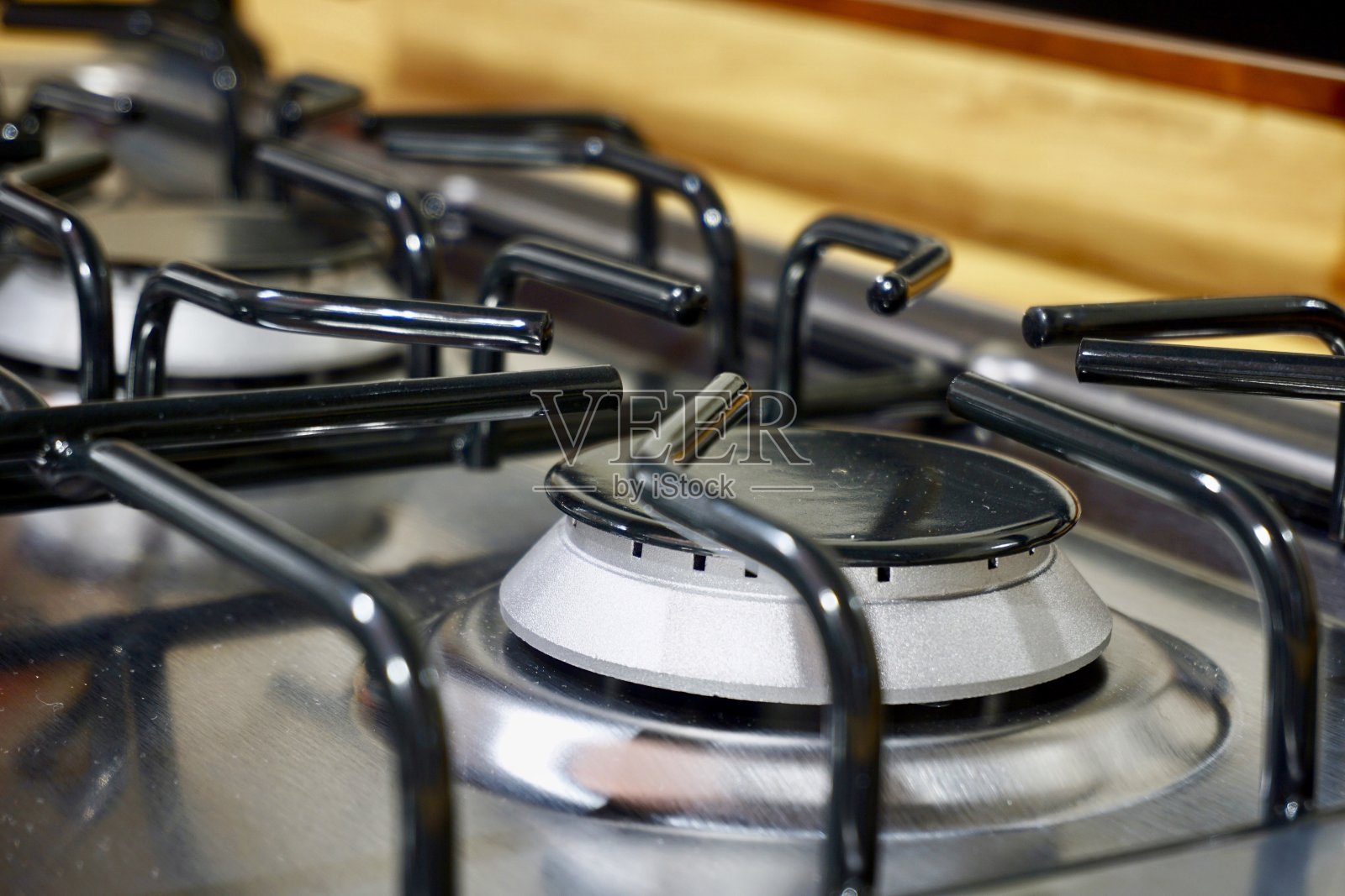 炉灶上的黑色灶具的特写照片摄影图片