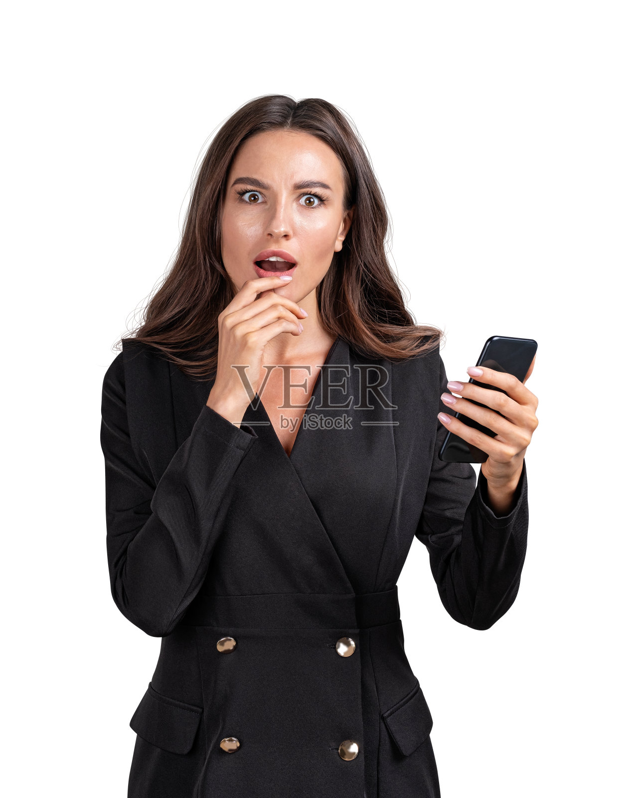 年轻迷人的震惊女商人穿着正装拿着智能手机照片摄影图片