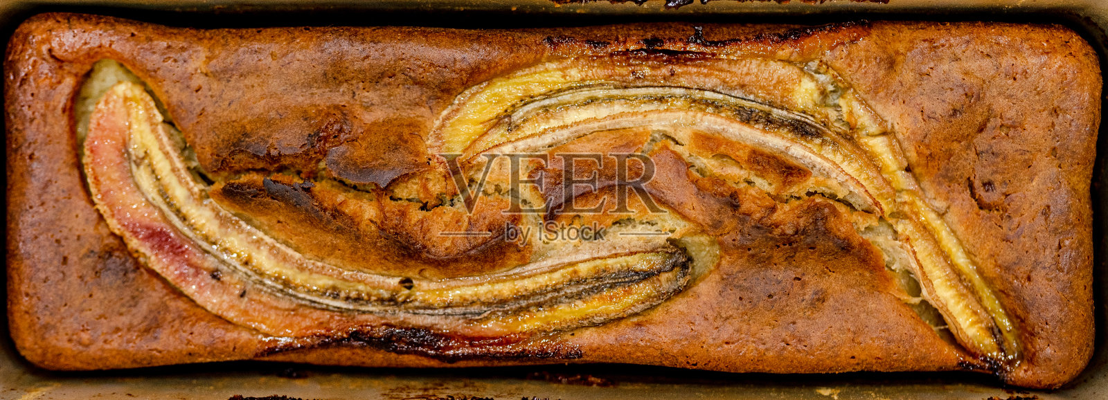 自制的香蕉面包。适当的营养照片摄影图片