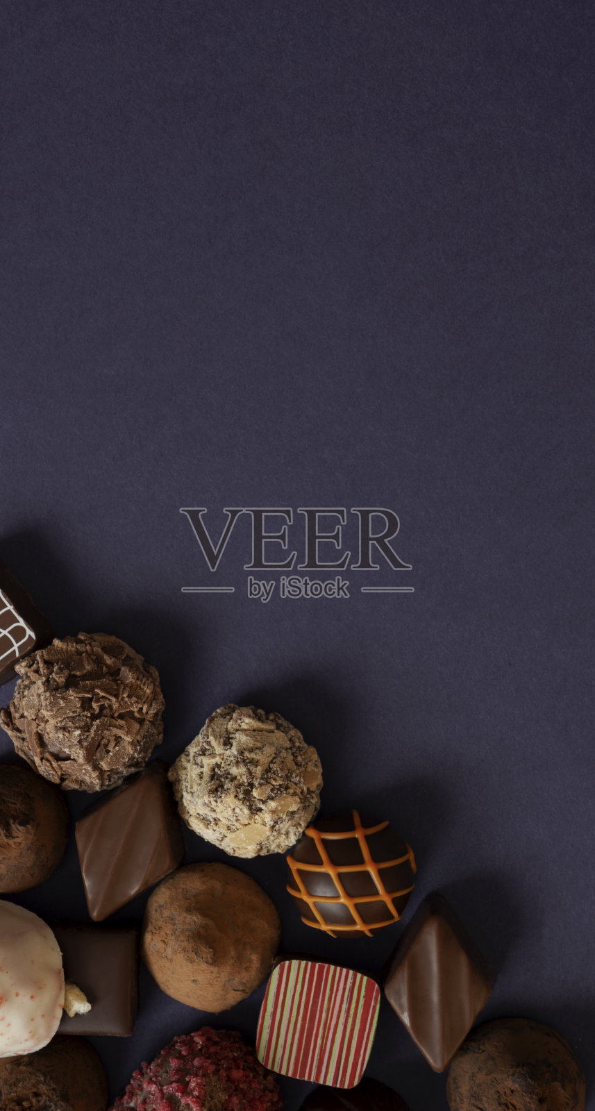 巧克力糖果的背景材料。照片摄影图片