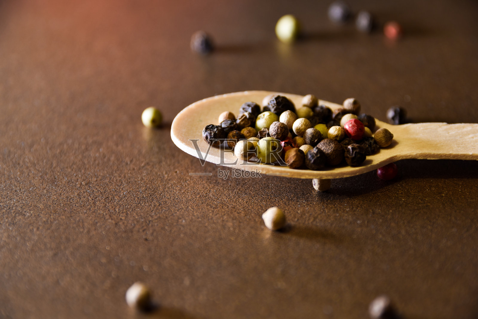 木勺加胡椒粉。厨房的概念照片摄影图片