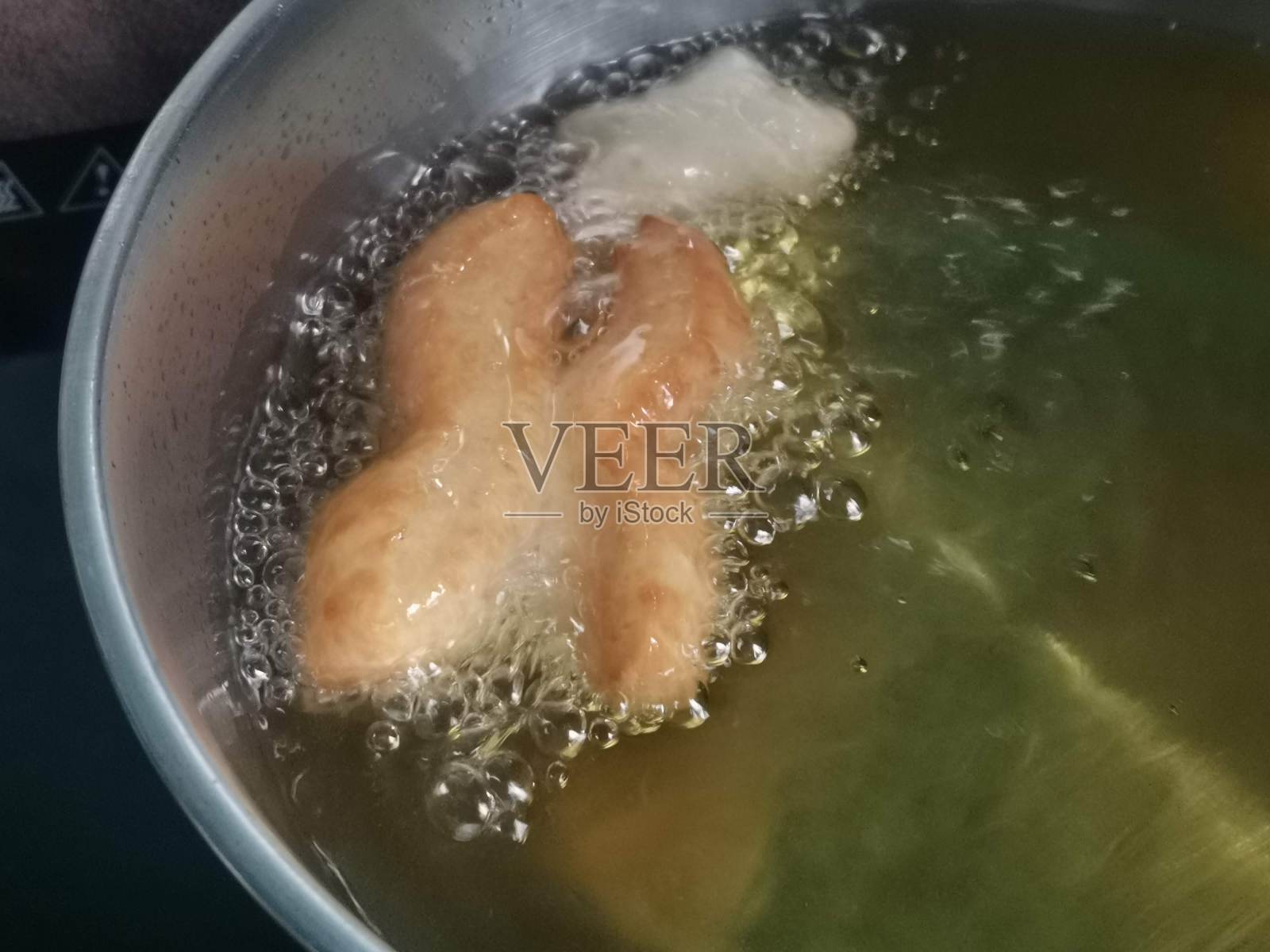 油条油炸照片照片摄影图片