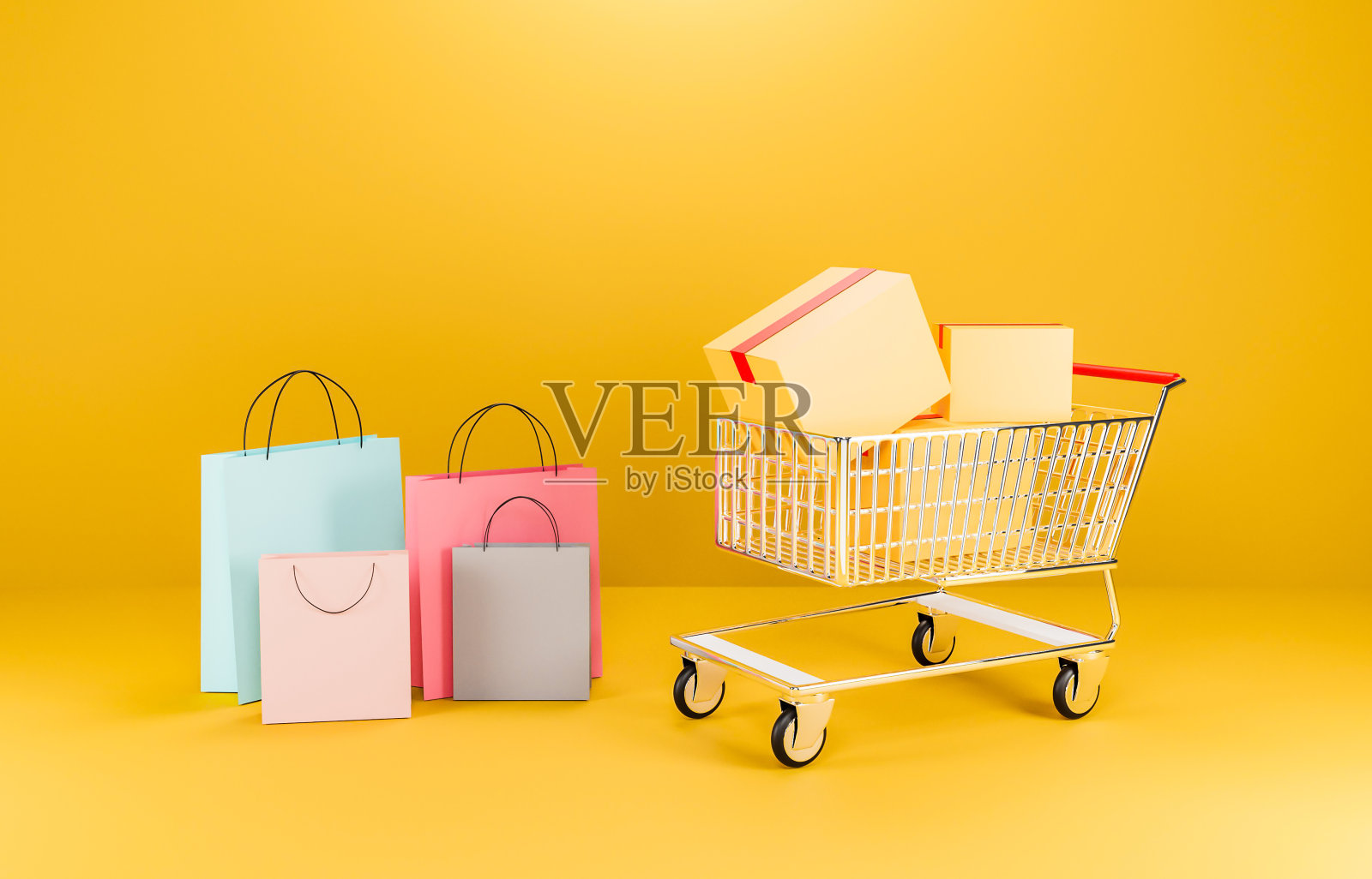 3 d演示。购物车上的购物袋和盒子照片摄影图片