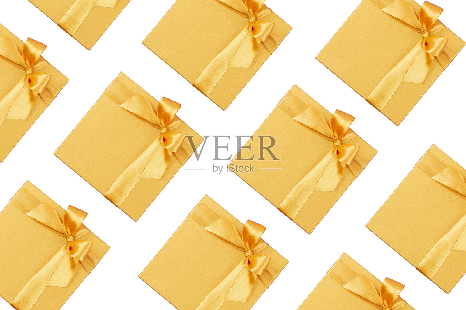 白色背景上的黄色礼品盒照片摄影图片