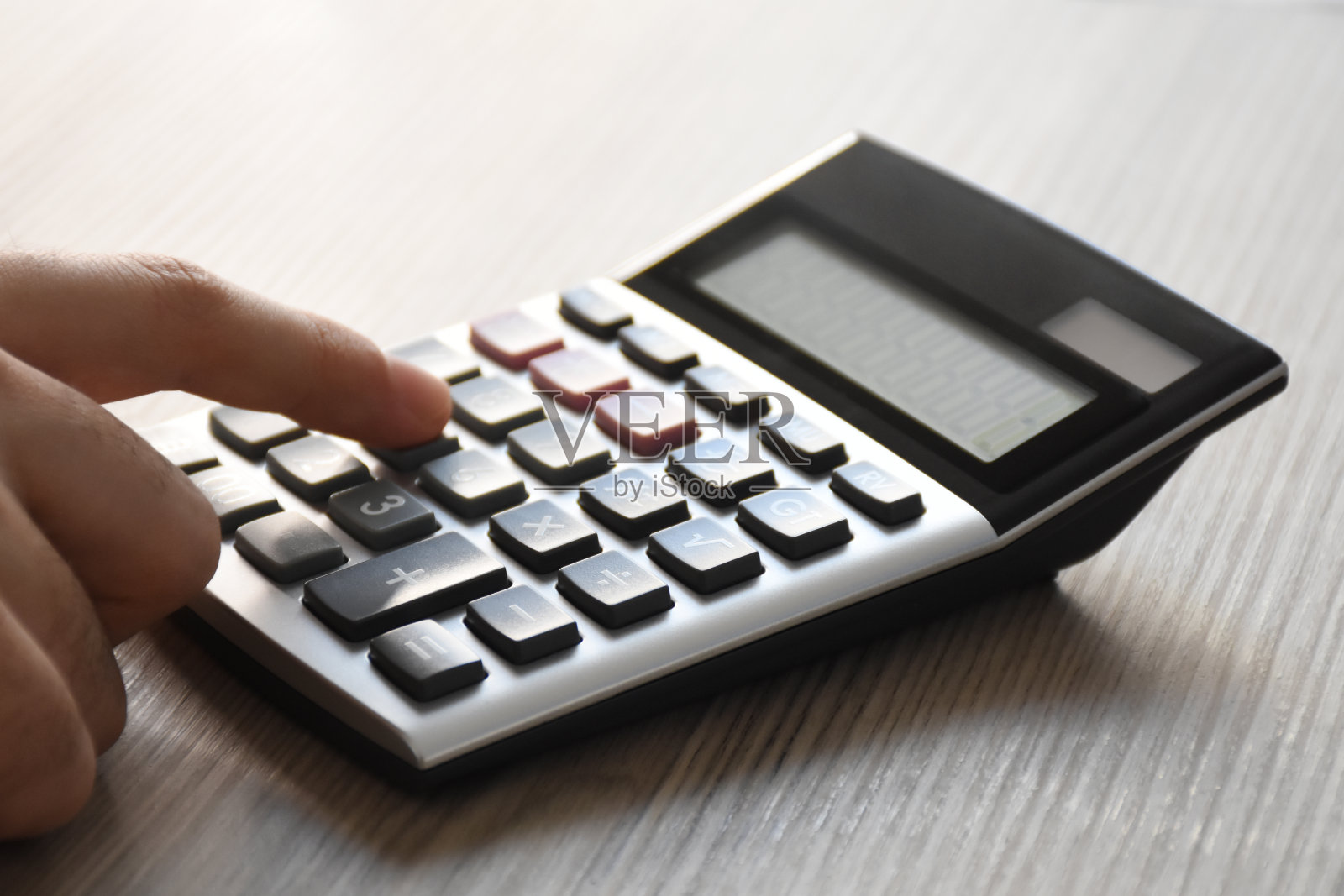 用桌上的计算器照片摄影图片