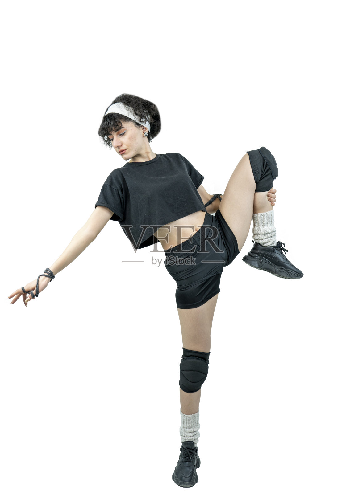 漂亮的年轻女子穿着运动服摆姿势照片摄影图片