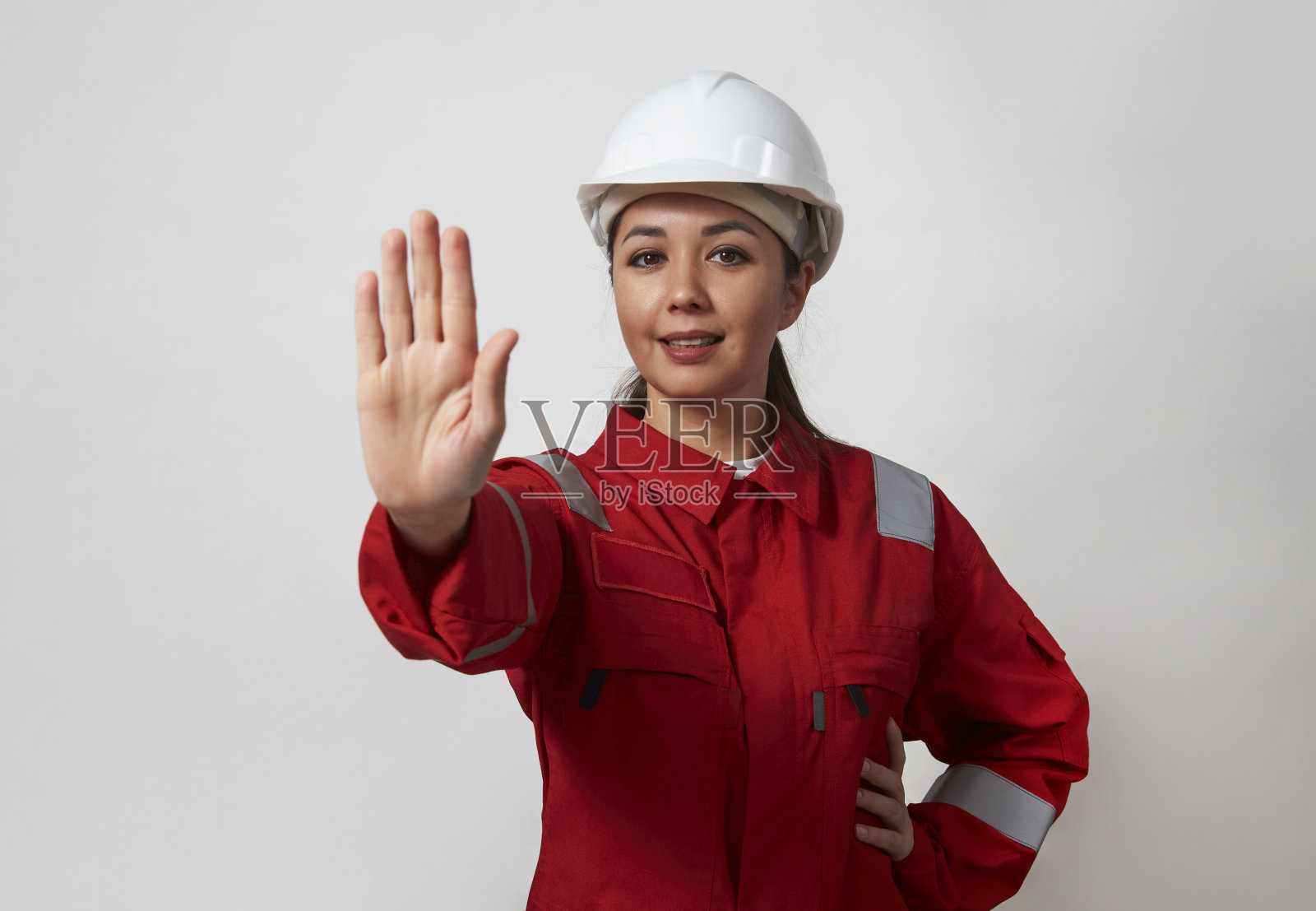 一名女工的肖像与手势停止照片摄影图片