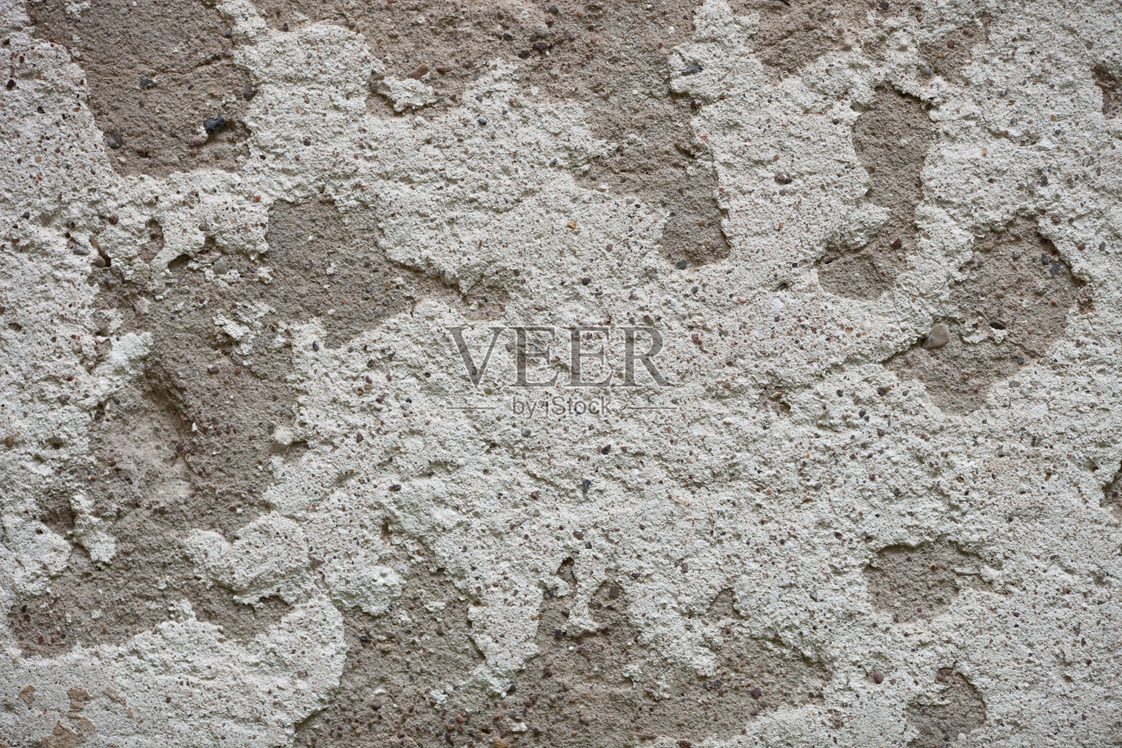 混凝土墙面纹理剥落，有裂缝和划痕。照片摄影图片